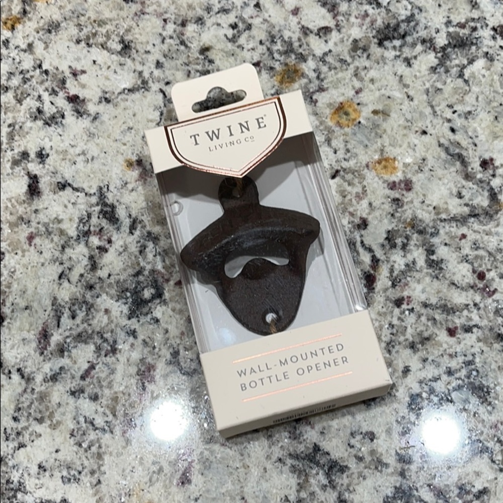 Wall-mounted bottle opener